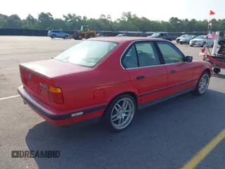 ✅ 1994 BMW 5 Series • VIN: WBAHE6317RGF25847 • Lot: 42413818. Listed on IAAI with 213,166 mi. Free auction sales archive from the USA and detailed vehicle history report at DreamBid. Image 4.