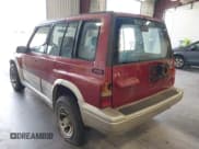 ✅ 1997 Suzuki Sidekick • VIN: JS3TD21VXV4109381 • Лот: 42745244. Опубликован ранее на IAAI с пробегом 195 973 миль. Бесплатный доступ к архиву аукционных продаж из США и подробный отчёт об истории автомобиля на DreamBid. Изображение 3.