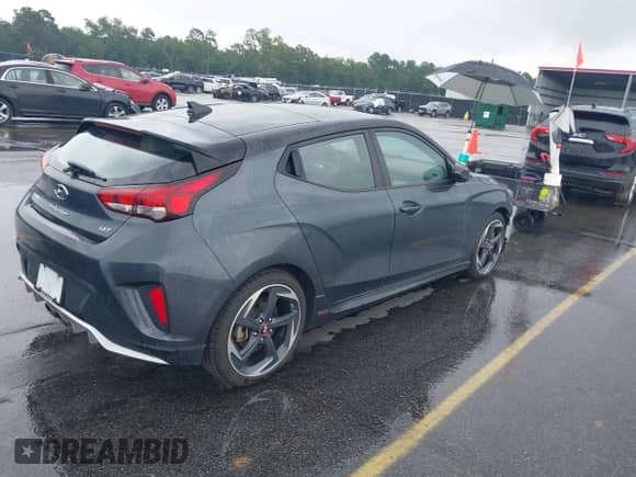 2019 Hyundai Veloster Turbo Ultimate z VIN KMHTH6AB5KU005677, wystawiony jako IAAI lot #42902553 z przebiegiem 96 790 mil mil oraz . Historia ofert i sprzedaży dostępna na DreamBid. Obrazek 4.
