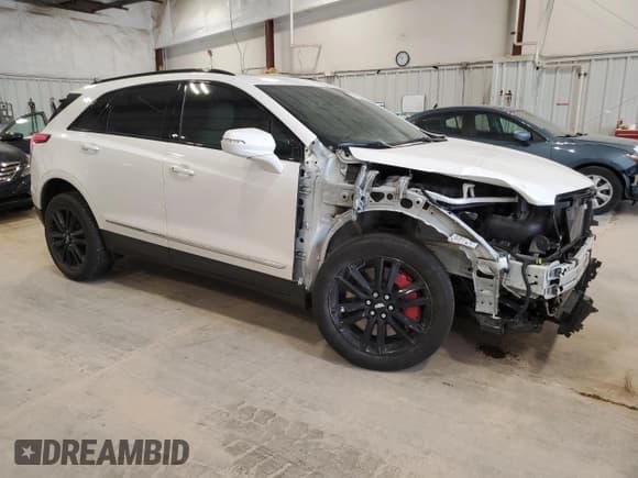 ✅ 2023 Cadillac XT5 AWD Sport • VIN: 1GYKNGRS9PZ166766 • Lot: 59189025. Listed on Copart with 36,110 mi. Free auction sales archive from the USA and detailed vehicle history report at DreamBid. Image 4.