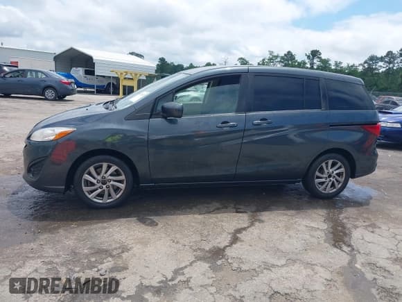✅ 2012 Mazda 5 Sport • VIN: JM1CW2BL6C0130500 • Lot: 42258823. Listed on IAAI with 140,243 mi. Free auction sales archive from the USA and detailed vehicle history report at DreamBid. Image 15.
