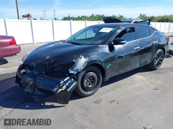 ✅ 2017 Nissan Maxima Platinum • VIN: 1N4AA6AP9HC409694 • Lot: 43689841. Wystawiony na IAAI z przebiegiem 91 658 mil. Bezpłatny archiwum sprzedaży aukcyjnych z USA i szczegółowy raport historii pojazdu na DreamBid. Zdjęcie 21.