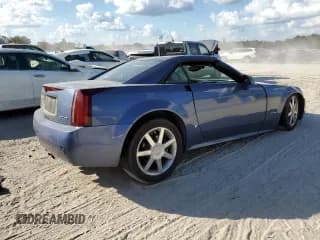 ✅ 2006 Cadillac XLR • VIN: 1G6YV36A065601591 • Lot: 76537084. Wystawiony na Copart z przebiegiem Nie podano. Bezpłatny archiwum sprzedaży aukcyjnych z USA i szczegółowy raport historii pojazdu na DreamBid. Zdjęcie 3.
