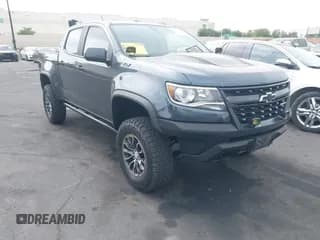 ✅ 2019 Chevrolet Colorado 4WD ZR2 • VIN: 1GCGTEEN0K1353097 • Лот: 42574987. Опубликован ранее на IAAI с пробегом 97 365 миль. Бесплатный доступ к архиву аукционных продаж из США и подробный отчёт об истории автомобиля на DreamBid. Изображение 1.