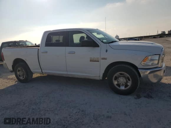 ✅ 2013 Ram 2500 SLT • VIN: 3C6TR4DT6DG537334 • Lot: 69632455. Listed on Copart with 141,767 mi. Free auction sales archive from the USA and detailed vehicle history report at DreamBid. Image 4.