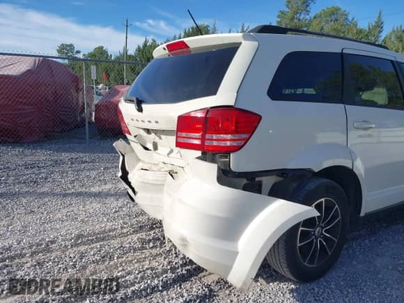 2018 Dodge Journey SE with VIN 3C4PDCABXJT288750, listed as a IAAI auction lot 43500199 with 205,018 mi miles and . Bid and sale history available at DreamBid. Image 19.