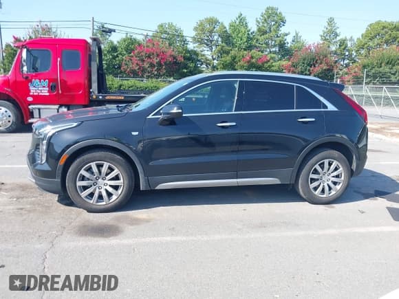 ✅ 2022 Cadillac XT4 FWD Premium Luxury • VIN: 1GYFZCR42NF111395 • Lot: 42772446. Wystawiony na IAAI z przebiegiem 29 059 mil. Bezpłatny archiwum sprzedaży aukcyjnych z USA i szczegółowy raport historii pojazdu na DreamBid. Zdjęcie 14.