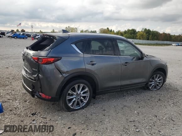 ✅ 2021 Mazda CX-5 Grand Touring • VIN: JM3KFBDM5M0455018 • Lot: 83847965. Wystawiony na Copart z przebiegiem 10 530 mil. Bezpłatny archiwum sprzedaży aukcyjnych z USA i szczegółowy raport historii pojazdu na DreamBid. Zdjęcie 3.