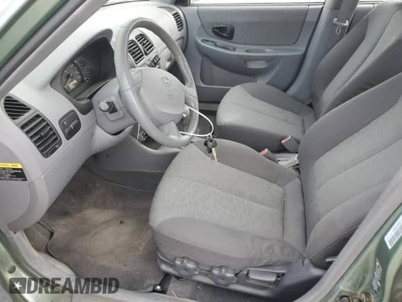 2004 Hyundai Accent GL с VIN KMHCG45C14U540938, выставлен на аукционе Copart как лот 46701935 с пробегом 71 891 миль миль и Списание • Salvage title. История ставок и продаж доступна на DreamBid. Изображение 7.