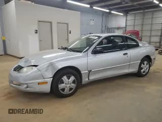 ✅ 2003 Pontiac Sunfire • VIN: 1G2JB12F637196189 • Lot: 60882435. Wystawiony na Copart z przebiegiem 189 046 mil. Bezpłatny archiwum sprzedaży aukcyjnych z USA i szczegółowy raport historii pojazdu na DreamBid. Zdjęcie 1.
