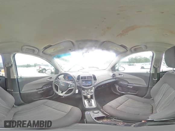 2015 Chevrolet Sonic LT z VIN 1G1JC5SHXF4103013, wystawiony jako Copart lot #71414114 z przebiegiem 169 575 mil mil oraz Szkoda całkowita • Salvage title. Historia ofert i sprzedaży dostępna na DreamBid. Obrazek 13.