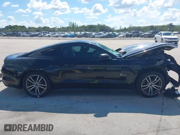 ✅ 2016 Ford Mustang EcoBoost • VIN: 1FA6P8TH8G5236307 • Lot: 42823503. Listed on IAAI with 140,028 mi. Free auction sales archive from the USA and detailed vehicle history report at DreamBid. Image 13.