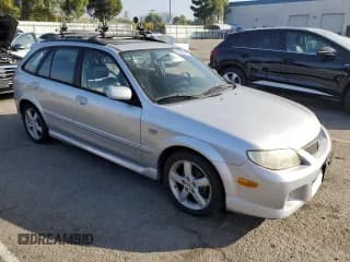 ✅ 2003 Mazda Protege • VIN: JM1BJ246331220991 • Lot: 86839925. Wystawiony na Copart z przebiegiem 118 760 mil. Bezpłatny archiwum sprzedaży aukcyjnych z USA i szczegółowy raport historii pojazdu na DreamBid. Zdjęcie 4.