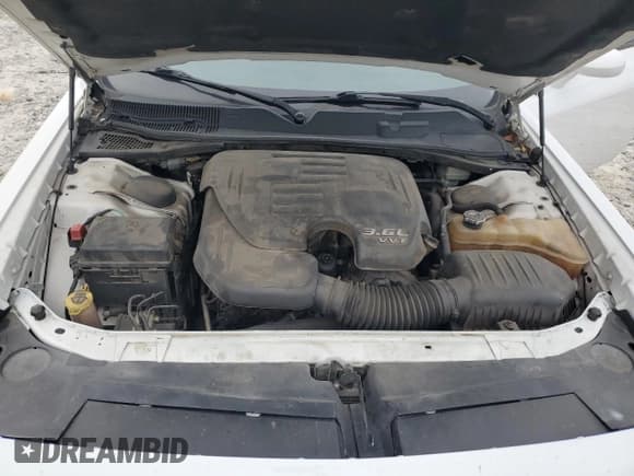 ✅ 2014 Dodge Challenger SXT • VIN: 2C3CDYAG5EH311359 • Lot: 70916784. Wystawiony na Copart z przebiegiem 236 076 mil. Bezpłatny archiwum sprzedaży aukcyjnych z USA i szczegółowy raport historii pojazdu na DreamBid. Zdjęcie 13.