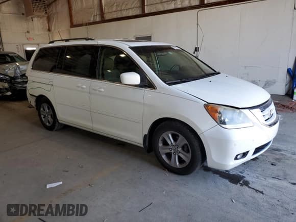 ✅ 2010 Honda Odyssey Touring • VIN: 5FNRL3H92AB079662 • Lot: 89865135. Listed on Copart with 145,766 mi. Free auction sales archive from the USA and detailed vehicle history report at DreamBid. Image 4.