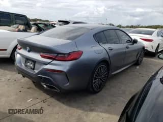 ✅ 2022 BMW 8 Series 840i • VIN: WBAGV2C03NCH48934 • Лот: 62350752. Опубликован ранее на Copart с пробегом Не указан. Бесплатный доступ к архиву аукционных продаж из США и подробный отчёт об истории автомобиля на DreamBid. Изображение 4.