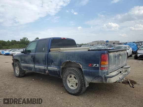 2002 Chevrolet Silverado 1500 LS with VIN 2GCEK19V321216162, listed as a Copart auction lot 84807685 with 287,684 mi miles and Salvage title. Bid and sale history available at DreamBid. Image 2.