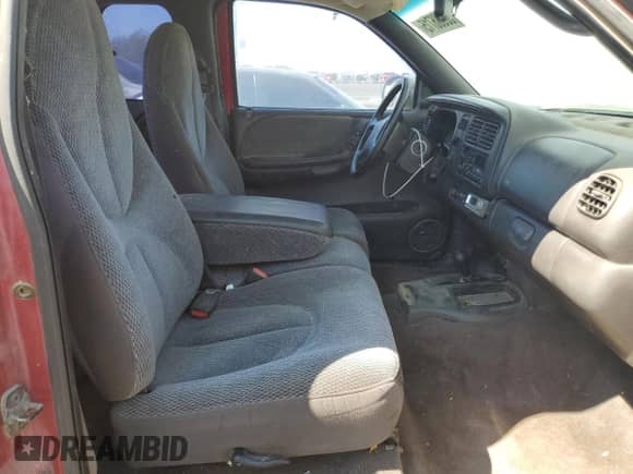 1999 Dodge Dakota SLT z VIN 1B7GG22X5XS215601, wystawiony jako Copart lot #80686715 z przebiegiem 273 332 mil mil oraz Czysty tytuł • Clean title. Historia ofert i sprzedaży dostępna na DreamBid. Obrazek 10.