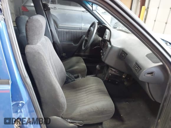 ✅ 1994 Pontiac Sunbird • VIN: 1G2JB54H3R7568960 • Лот: 42928144. Опубликован ранее на IAAI с пробегом 102 846 миль. Бесплатный доступ к архиву аукционных продаж из США и подробный отчёт об истории автомобиля на DreamBid. Изображение 5.