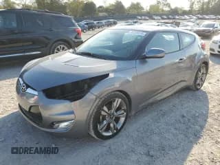 ✅ 2015 Hyundai Veloster • VIN: KMHTC6AD0FU221104 • Lot: 75229514. Listed on Copart with 136,469 mi. Free auction sales archive from the USA and detailed vehicle history report at DreamBid. Image 1.