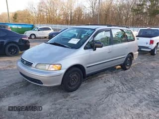✅ 1998 Honda Odyssey LX • VIN: JHMRA3863WC013751 • Lot: 41602578. Wystawiony na IAAI z przebiegiem 316 911 mil. Bezpłatny archiwum sprzedaży aukcyjnych z USA i szczegółowy raport historii pojazdu na DreamBid. Zdjęcie 2.