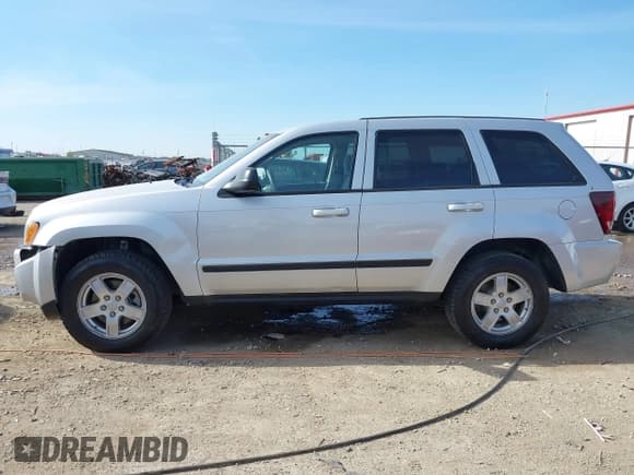 ✅ 2007 Jeep Grand Cherokee Laredo • VIN: 1J8GS48K87C663341 • Лот: 43636740. Опубликован ранее на IAAI с пробегом 198 156 миль. Бесплатный доступ к архиву аукционных продаж из США и подробный отчёт об истории автомобиля на DreamBid. Изображение 14.