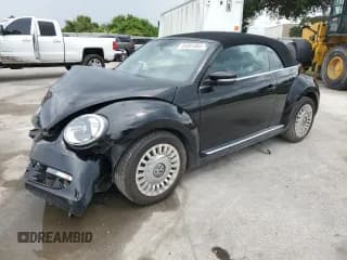 ✅ 2013 Volkswagen Beetle 2.5L • VIN: 3VW5P7AT3DM819183 • Лот: 81091885. Опубликован ранее на Copart с пробегом 80 368 миль. Бесплатный доступ к архиву аукционных продаж из США и подробный отчёт об истории автомобиля на DreamBid. Изображение 1.