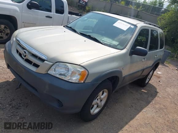 ✅ 2006 Mazda Tribute i • VIN: 4F2YZ02Z06KM13747 • Lot: 42978182. Listed on IAAI with 173,940 mi. Free auction sales archive from the USA and detailed vehicle history report at DreamBid. Image 2.