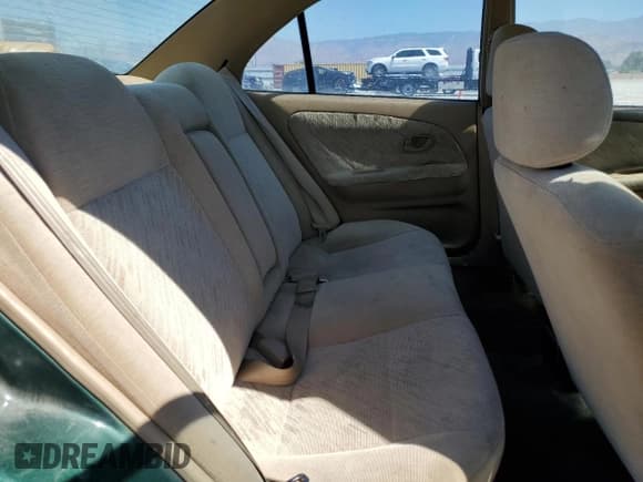 ✅ 2000 Mitsubishi Mirage DE • VIN: JA3AY26C8YU036869 • Лот: 66696405. Опубликован ранее на Copart с пробегом 302 635 миль. Бесплатный доступ к архиву аукционных продаж из США и подробный отчёт об истории автомобиля на DreamBid. Изображение 10.