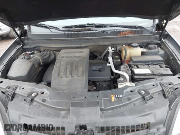 ✅ 2013 Chevrolet Captiva Sport LT • VIN: 3GNAL3EK4DS579698 • Lot: 41972058. Wystawiony na IAAI z przebiegiem 169 447 mil. Bezpłatny archiwum sprzedaży aukcyjnych z USA i szczegółowy raport historii pojazdu na DreamBid. Zdjęcie 10.