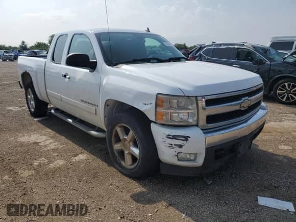 2008 Chevrolet Silverado 1500 2LT with VIN 2GCEK19J681254166, listed as a Copart auction lot 68043265 with 221,465 mi miles and Salvage title. Bid and sale history available at DreamBid. Image 4.