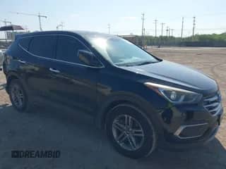 2018 Hyundai Santa Fe 2.4L z VIN 5NMZT3LB0JH057863, wystawiony jako IAAI lot #43207251 z przebiegiem 114 506 mil mil oraz . Historia ofert i sprzedaży dostępna na DreamBid. Obrazek 1.