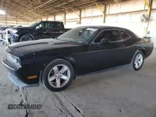 2014 Dodge Challenger SXT z VIN 2C3CDYAG5EH110982, wystawiony jako Copart lot #85419705 z przebiegiem 144 893 mil mil oraz Czysty tytuł • Clean title. Historia ofert i sprzedaży dostępna na DreamBid. Obrazek 1.