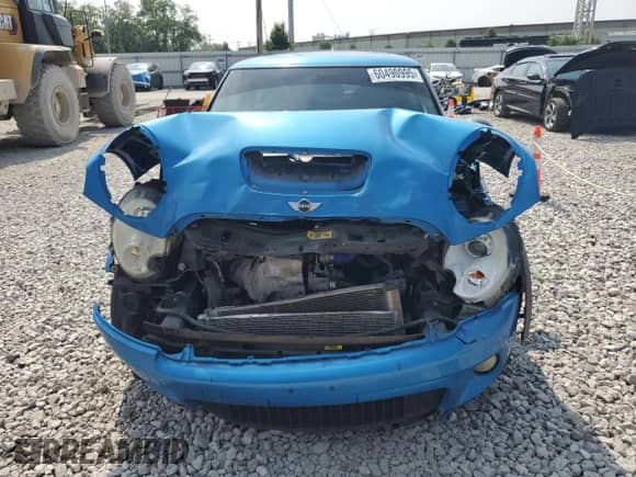 2007 MINI Hardtop S with VIN WMWMF73547TT84449, listed as a Copart auction lot 60490995 with 157,602 mi miles and Salvage title. Bid and sale history available at DreamBid. Image 5.