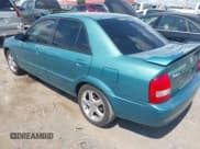 ✅ 2002 Mazda Protege DX • VIN: JM1BJ225120524478 • Lot: 42752160. Listed on IAAI with 193,561 mi. Free auction sales archive from the USA and detailed vehicle history report at DreamBid. Image 3.
