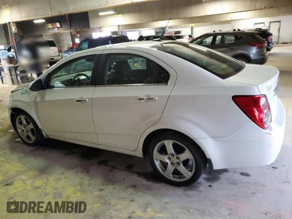 2012 Chevrolet Sonic LTZ with VIN 1G1JE5SH9C4143735, listed as a Copart auction lot 47083355 with 109,585 mi miles and Salvage title. Bid and sale history available at DreamBid. Image 2.
