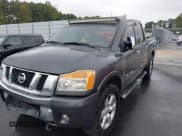 ✅ 2009 Nissan Titan SE • VIN: 1N6BA07D59N317090 • Lot: 43367465. Listed on IAAI with 167,406 mi. Free auction sales archive from the USA and detailed vehicle history report at DreamBid. Image 2.