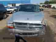 2004 Dodge Dakota z VIN 1D7GL12K94S595067, wystawiony jako Copart lot #71470414 z przebiegiem 157 284 mil mil oraz Czysty tytuł • Clean title. Historia ofert i sprzedaży dostępna na DreamBid. Obrazek 5.