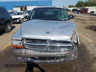 2004 Dodge Dakota z VIN 1D7GL12K94S595067, wystawiony jako Copart lot #71470414 z przebiegiem 157 284 mil mil oraz Czysty tytuł • Clean title. Historia ofert i sprzedaży dostępna na DreamBid. Obrazek 5.
