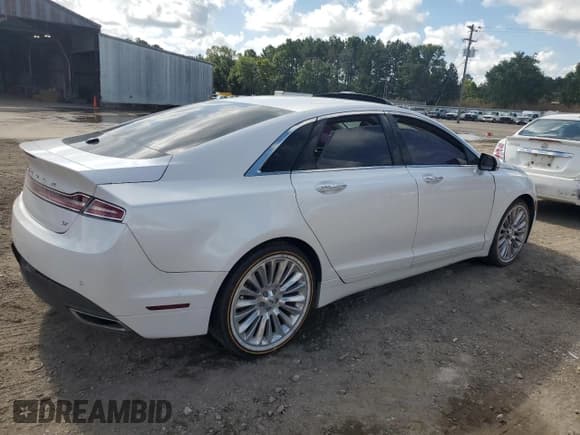 ✅ 2014 Lincoln MKZ • VIN: 3LN6L2GKXER805611 • Lot: 63281535. Wystawiony na Copart z przebiegiem 102 906 mil. Bezpłatny archiwum sprzedaży aukcyjnych z USA i szczegółowy raport historii pojazdu na DreamBid. Zdjęcie 3.
