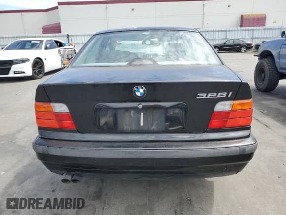 1998 BMW 3 Series z VIN WBACD3321WAV24693, wystawiony jako Copart lot #66515794 z przebiegiem 228 492 mil mil oraz Szkoda całkowita • Salvage title. Historia ofert i sprzedaży dostępna na DreamBid. Obrazek 6.