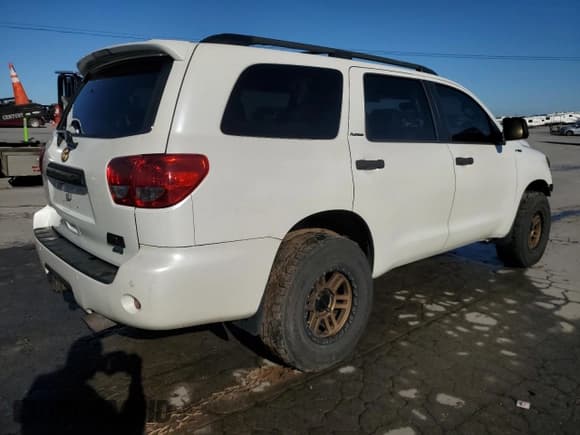 ✅ 2012 Toyota Sequoia Platinum • VIN: 5TDDW5G14CS062207 • Lot: 85547175. Listed on Copart with 171,208 mi. Free auction sales archive from the USA and detailed vehicle history report at DreamBid. Image 3.