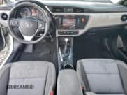 ✅ 2018 Toyota Corolla SE • VIN: 5YFBURHE3JP781301 • Lot: 93660435. Listed on Copart with 99,335 mi. Free auction sales archive from the USA and detailed vehicle history report at DreamBid. Image 8.