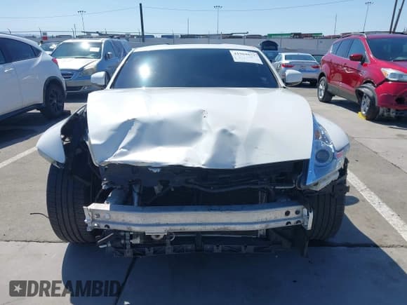 ✅ 2009 Nissan 370Z Touring • VIN: JN1AZ44E99M411252 • Lot: 41969671. Listed on IAAI with 91,873 mi. Free auction sales archive from the USA and detailed vehicle history report at DreamBid. Image 12.