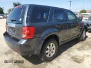 ✅ 2010 Mazda Tribute Sport • VIN: 4F2CY0C75AKM07347 • Lot: 85187645. Listed on Copart with 182,346 mi. Free auction sales archive from the USA and detailed vehicle history report at DreamBid. Image 3.