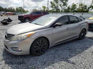 ✅ 2013 Hyundai Azera • VIN: KMHFH4JG1DA230468 • Лот: 68003885. Опубликован ранее на Copart с пробегом 147 684 миль. Бесплатный доступ к архиву аукционных продаж из США и подробный отчёт об истории автомобиля на DreamBid. Изображение 1.