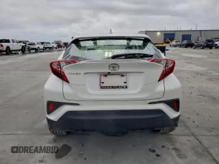 ✅ 2019 Toyota C-HR LE • VIN: JTNKHMBX0K1061988 • Лот: 94548045. Опубликован ранее на Copart с пробегом 81 122 миль. Бесплатный доступ к архиву аукционных продаж из США и подробный отчёт об истории автомобиля на DreamBid. Изображение 6.