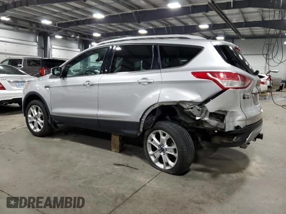 ✅ 2016 Ford Escape Titanium • VIN: 1FMCU9J95GUC27654 • Лот: 51950575. Опубликован ранее на Copart с пробегом 101 220 миль. Бесплатный доступ к архиву аукционных продаж из США и подробный отчёт об истории автомобиля на DreamBid. Изображение 2.