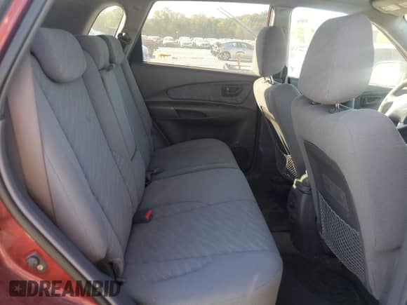 2005 Hyundai Tucson GL z VIN KM8JM12BX5U102835, wystawiony jako Copart lot #76761124 z przebiegiem 194 020 mil mil oraz Szkoda całkowita • Salvage title. Historia ofert i sprzedaży dostępna na DreamBid. Obrazek 10.