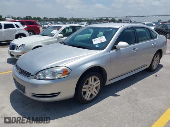 ✅ 2014 Chevrolet Impala LT • VIN: 2G1WB5E35E1143258 • Lot: 42375275. Listed on IAAI with 172,680 mi. Free auction sales archive from the USA and detailed vehicle history report at DreamBid. Image 2.